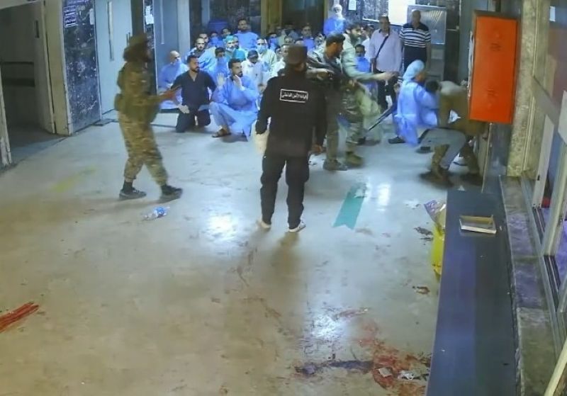 A video has gone viral on the internet showing a group of armed men forcing staff in a Syrian hospital to kneel, and then they executed one of them who resisted.