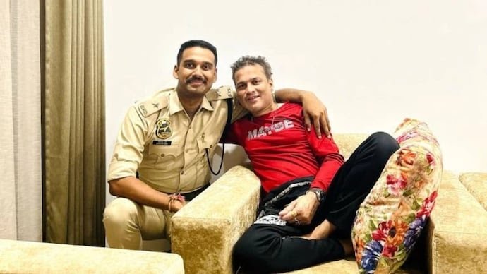 Assam Police Officer Sandipan Garg posing with his cousin Zubeen Garg.