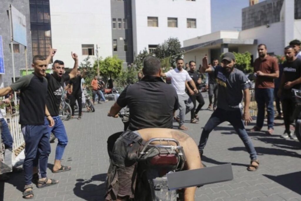 A street scene reportedly from Gaza on October 7, 2023, when Palestinians celebrated the mass murder and kidnapping of Israelis by the Islamist militant group Hamas