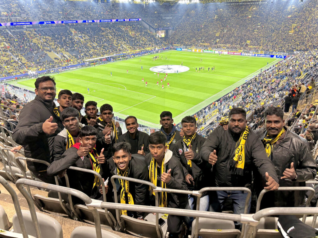 The MYFA squad attends a UEFA Champions League match during its recent visit to Germany