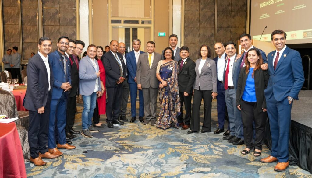 Suresh Prabhu, Guest of Honour (wearing a yellow tie), with Anuradha Shroff, first woman president of ICAI Singapore Chapter, to his left, flanked by members of the Institute of Chartered Accountants of India (ICAI), Singapore Chapter