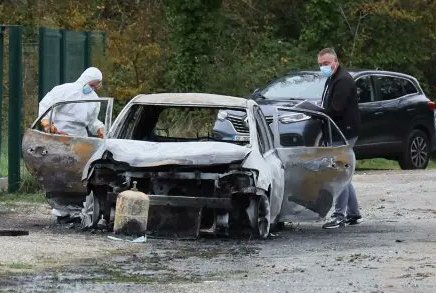 French paramilitary personnel inspect the car used by a 35-year-old driver to deliberately hit several pedestrians and cyclists on Ile d’Oleron on November 5