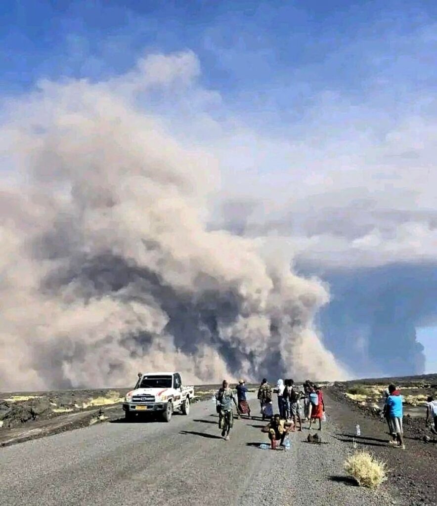 Thick plumes of smoke from the volcano covering the sky