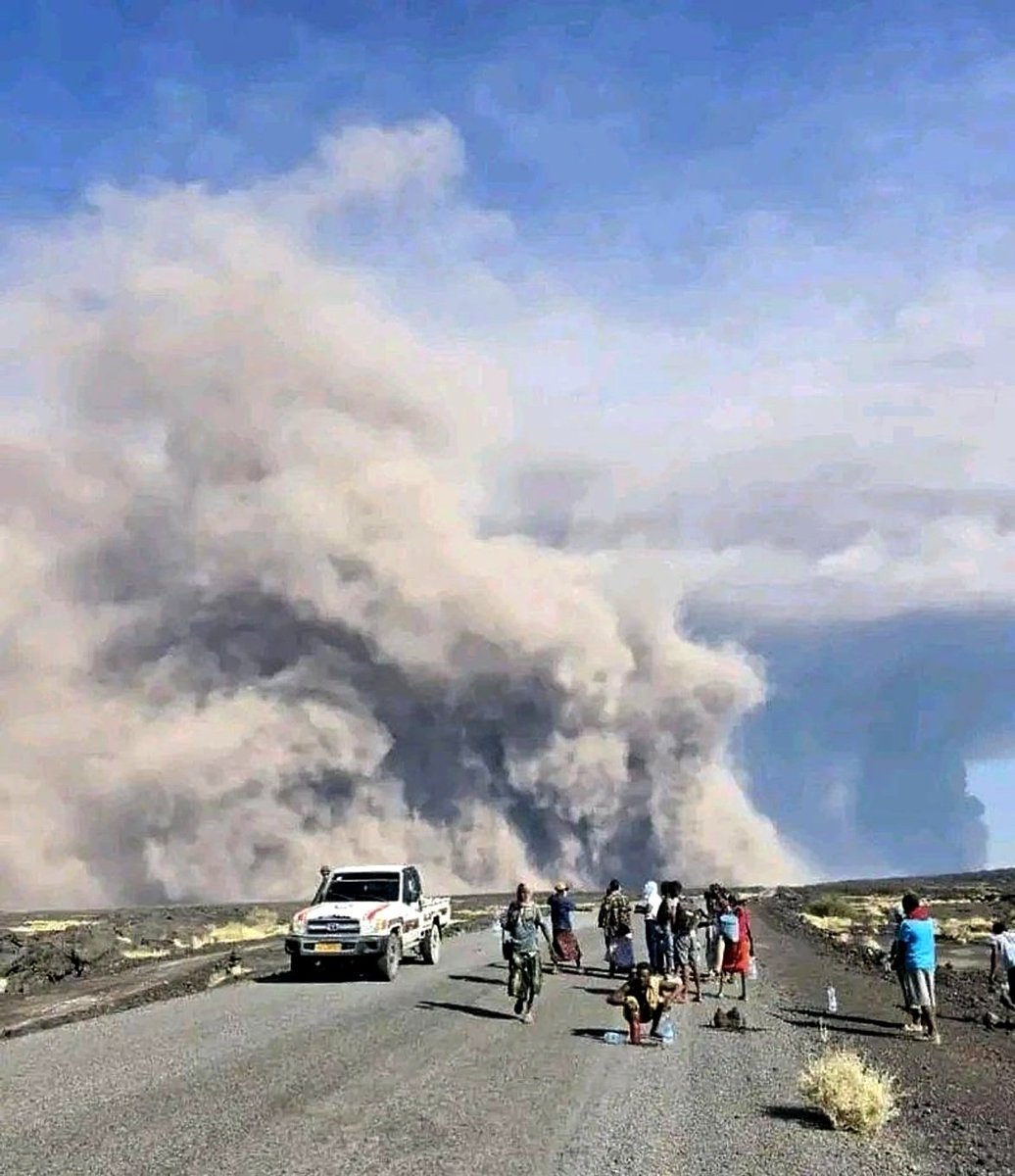 Thick plumes of smoke from the volcano covering the sky