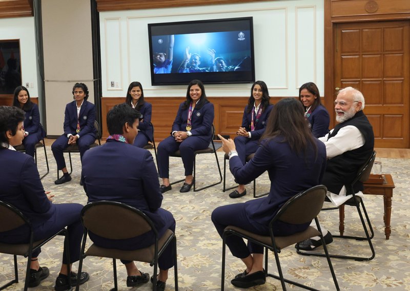 The Indian women’s cricket team interacts with PM Modi