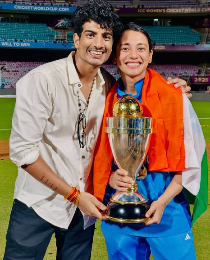 Palash Muchhal and Smriti Mandhana with the ICC Women's Cricket World Cup at the DY Patil Stadium, Navi Mumbai