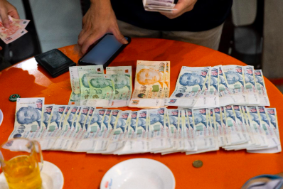 Cash seized from enforcement operations across Singapore against illegal gambling